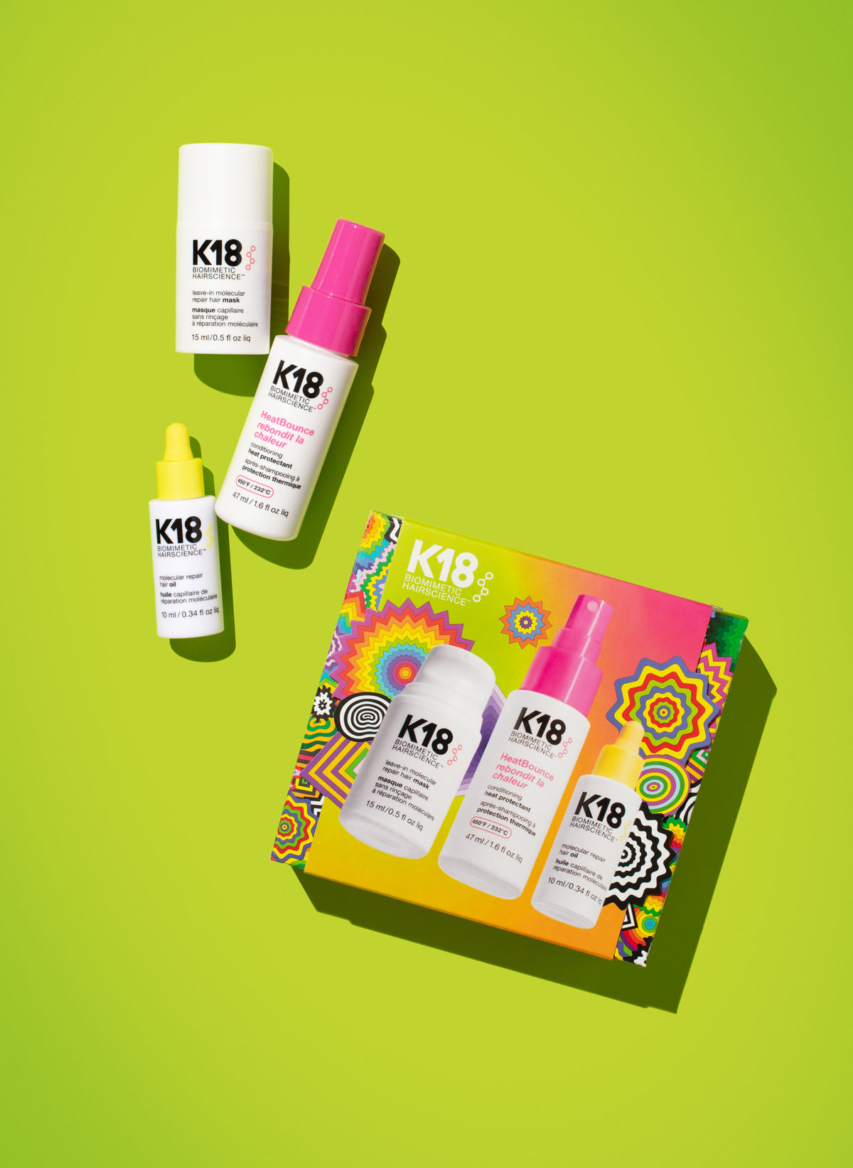 K18 Australia repair, protect, and smooth holiday kit with hair treatment bottles on a neutral background.