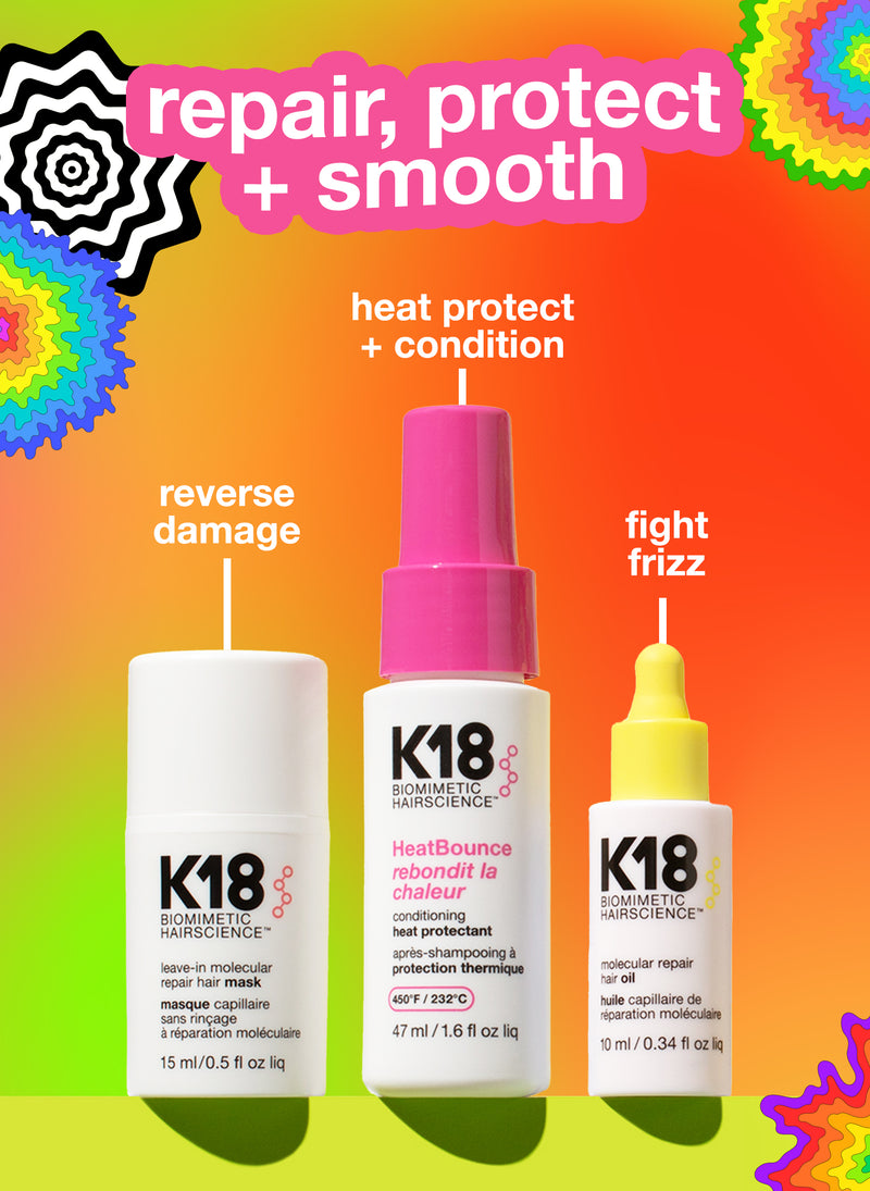 K18 Australia repair, protect, and smooth holiday kit with hair treatment bottles and accessories for damaged hair care.